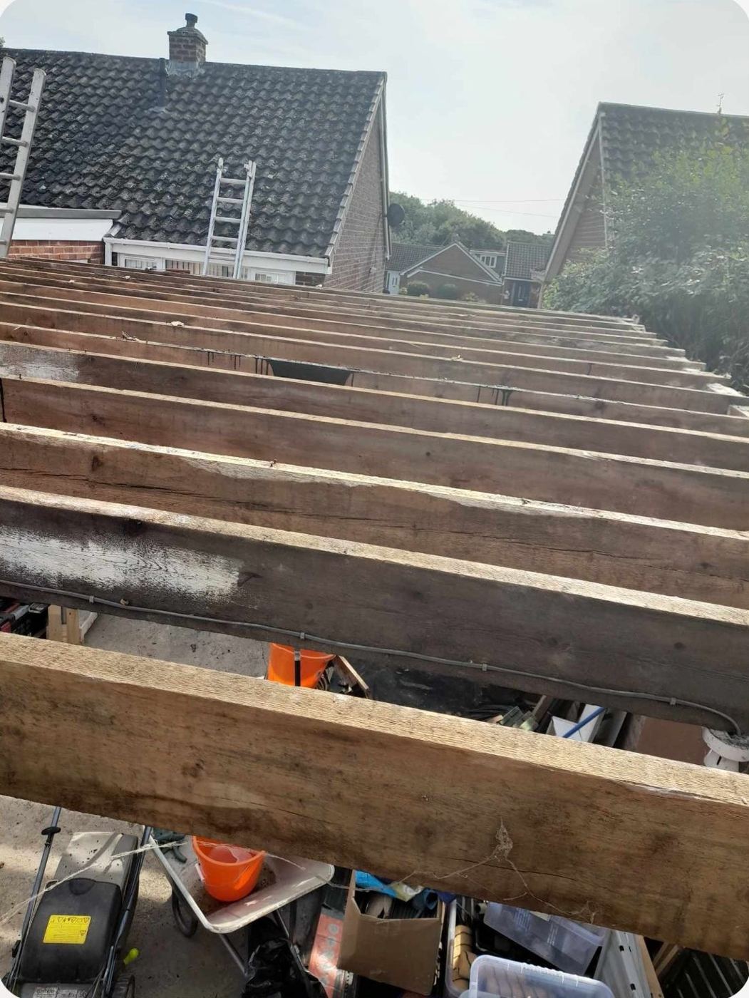 New structural timber rafters during a roof repair